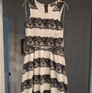 White dress with black lace pattern from Stitch Fi